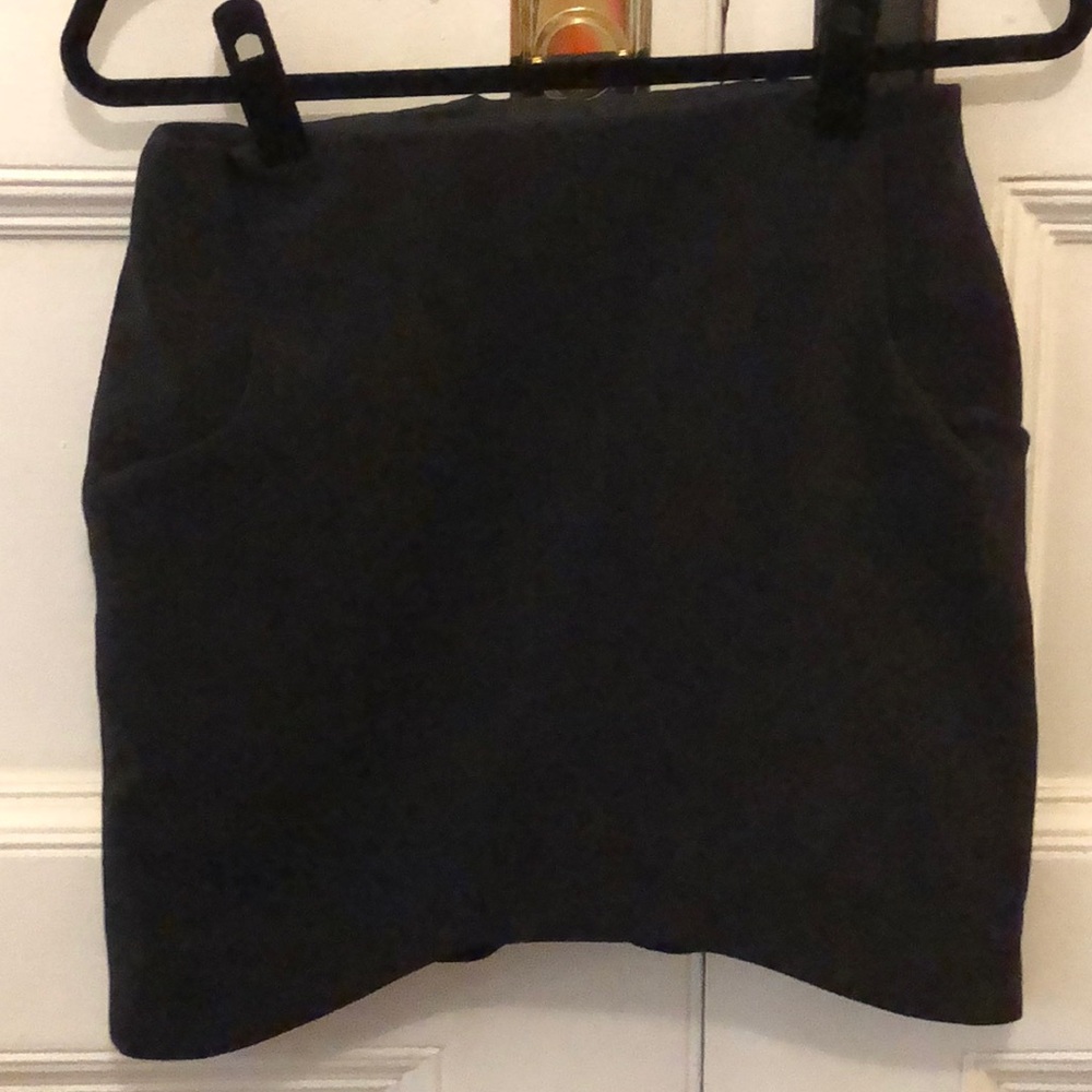 Black mini skirt with detailed hemline